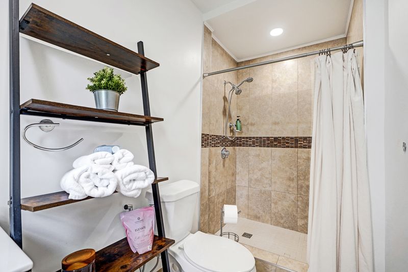 Bathroom with a tiled shower