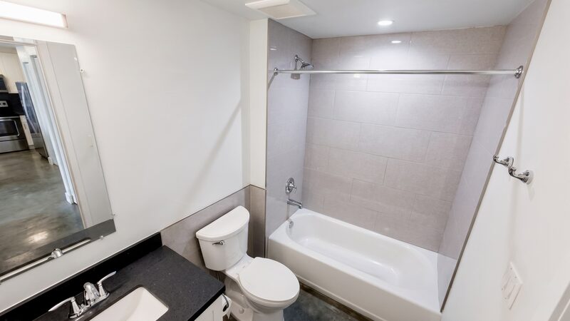 Unit bathroom with a walk-in shower at 4332 W Flagler Street