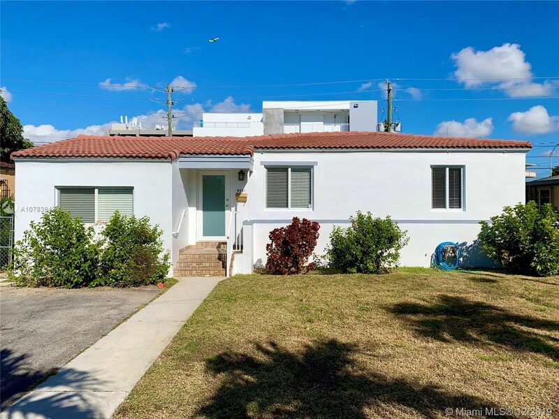 Renovated single-family home at 4331 SW 1st Street, directly behind the building