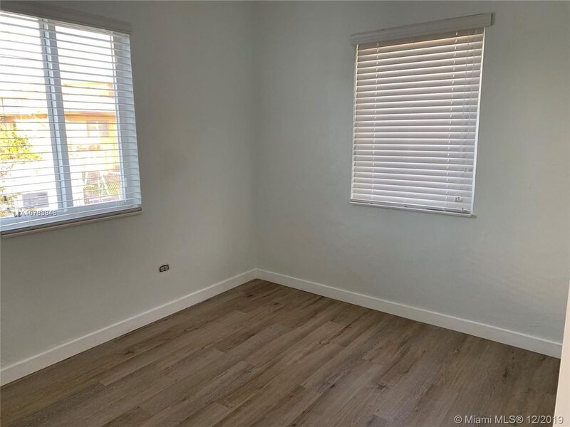 Bedroom with two windows at 4331 SW 1st Street