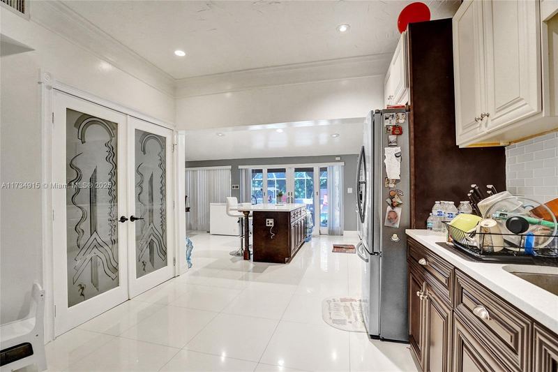 Kitchen with etched glass double doors