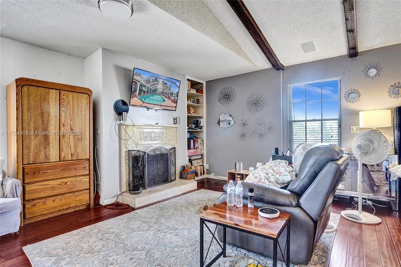 Primary suite sitting area by the fireplace
