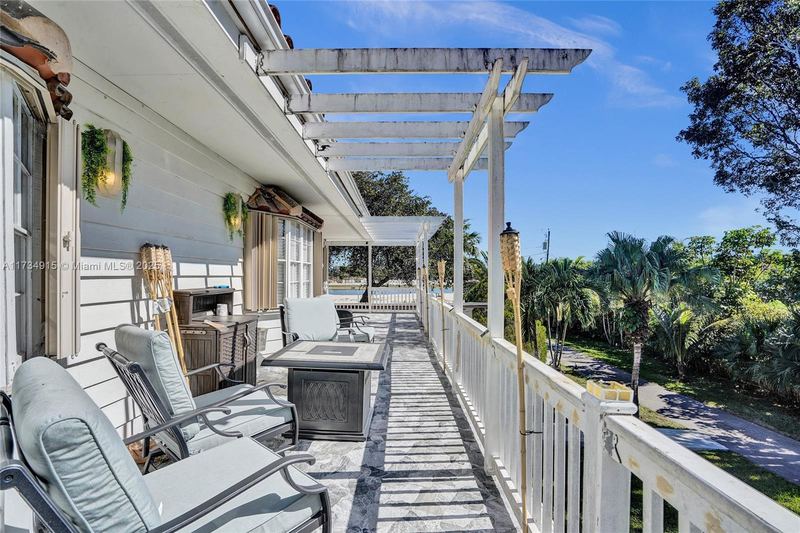 Upstairs balcony with outdoor seating