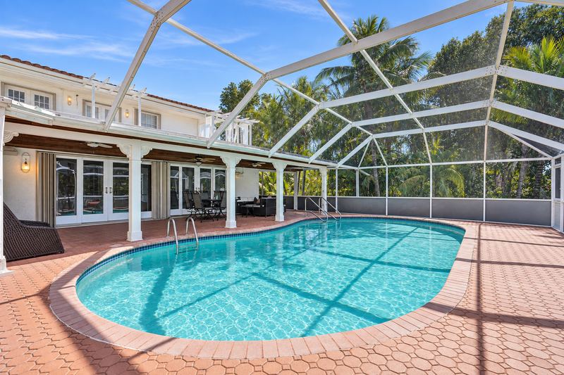 Screened pool with a covered patio