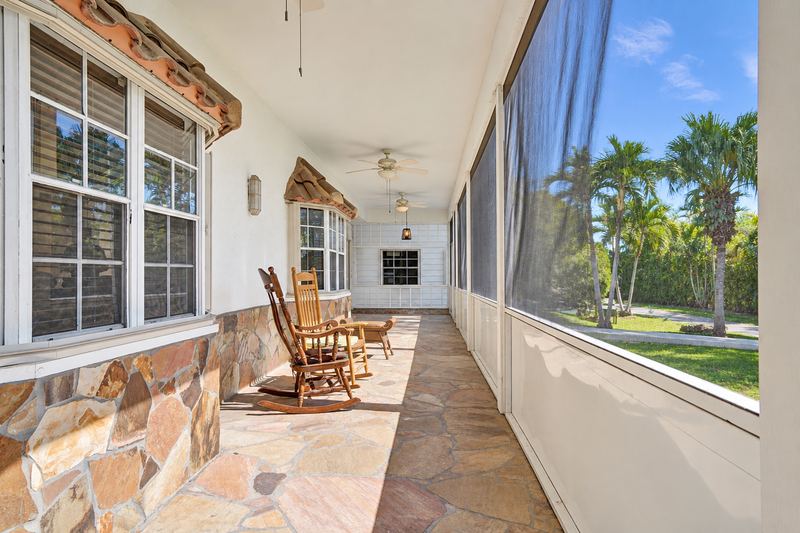Screened porch with stone flooring