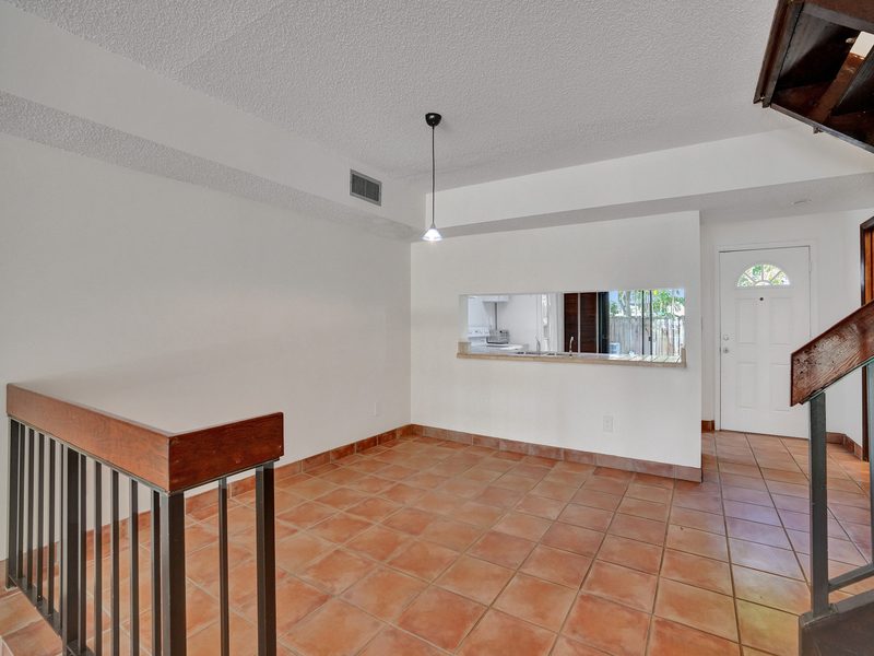 Open living and dining area at 4863 SW 71st Place, Miami