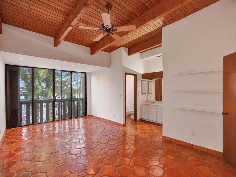 Living area with a wood-beam ceiling at 4863 SW 71st Place, Miami