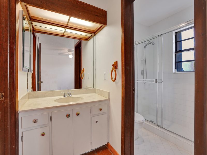Glass-enclosed shower at 4863 SW 71st Place, Miami