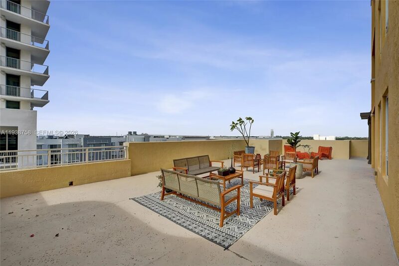 Patio entertaining at 7350 SW 89th St, Unit 911S, Toscano Condo, Miami