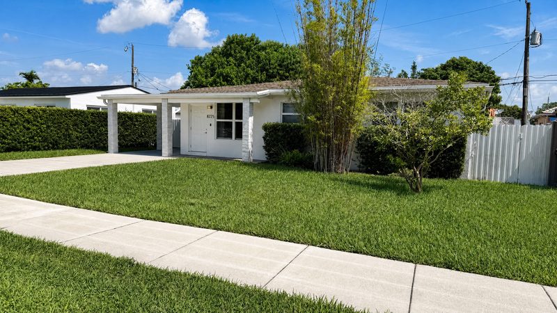 Street view of the front exterior and carport at 8225 SW 44th Street, Miami