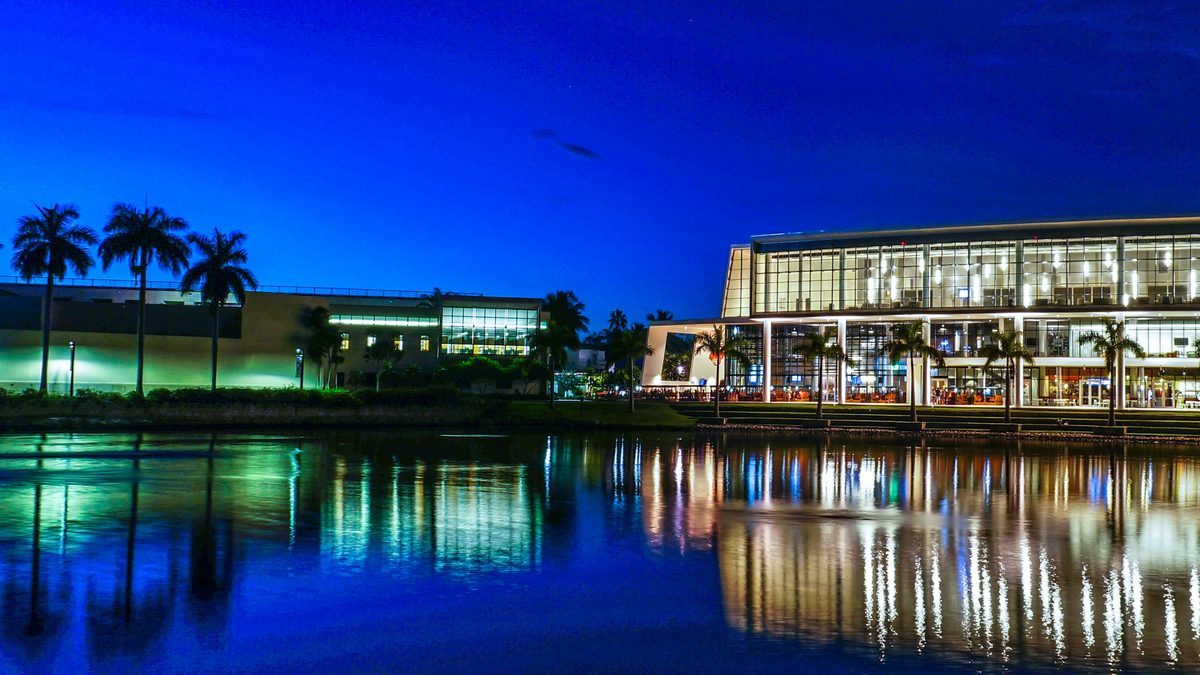 University of Miami Coral Gables campus at dusk reflected in the campus lake